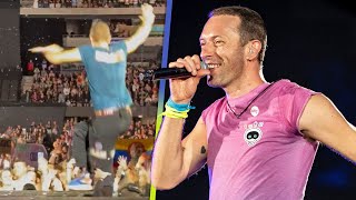 Watch Chris Martin FALL BACKWARDS Into Trap Door During Coldplay Show [upl. by Jenna651]