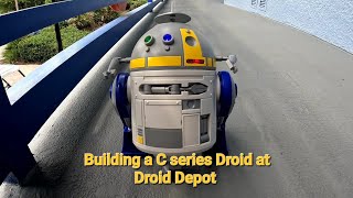 Building a Cseries Droid at Droid Depot in Batuu Galaxys edge Disney world droiddepot chopper [upl. by Karena]