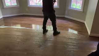 Applying final coat of polyurethane on hardwood floors [upl. by Atinaej]