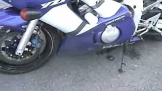 Motorcycle crashes during wheelie sends pieces flying  Yamaha R6 [upl. by Htiekel]