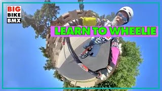 Learn to wheelie a 29 inch BMX bike  from a 47 year old dad [upl. by Eppie]