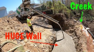 Building a Redi Rock retaining wall on a creek [upl. by Tsirc]