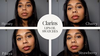 Clarins Lip Comfort Oil Swatches on Tan Skin  Honey Cherry Pitaya and Strawberry [upl. by Notnirt]