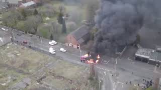 Loyalists burn a bus on Shankill Road and locals cheer them on [upl. by Benia]