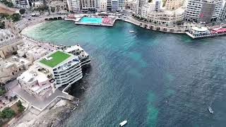 Malta saint julians bay spinola bay balluta bay Hilton coastline Dji mini 4 pro [upl. by Joacima]