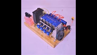 MINI REAL 14cc Inline 4 Cylinder Fourstroke Watercooled Engine  TOYAN FSL400 [upl. by Meer]