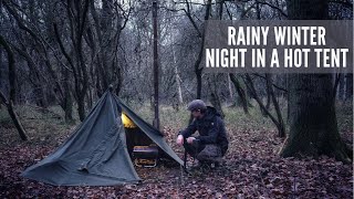 Winter Lavvu Hot Tent Camping in the Rain  Bushcraft  Military Surplus Gear amp Gstove Cooking [upl. by Adnuahsar]