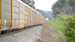 A very long CSX autorack train over 9943 ft long almost 2 miles with loaded autoracks [upl. by Dumas]