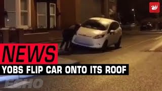 Mischief Night yobs flip car onto its roof in south Liverpool [upl. by Siriso]