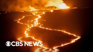 Lava flowing from Hawaiis Mauna Loa draws thousands of people [upl. by Tahpos505]