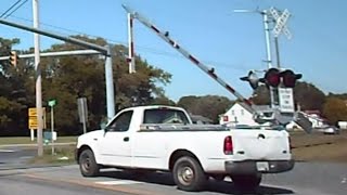 Pick Up Truck Almost Gets Hit By Gate And Train [upl. by Ameluz260]