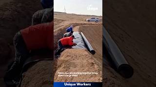 Plastic sheeting being laid down desert  The workers do their job perfectly  machine shorts [upl. by Whitaker]