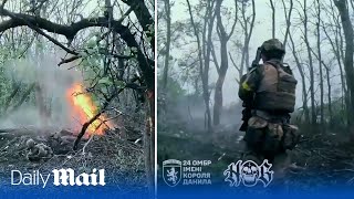 Ukraine 24th Brigade raid Russian trench near Bakhmut in firstperson footage [upl. by Aidnama208]