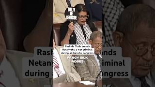 Democrat Rashida Tlaib holds sign accusing Netanyahu of genocide during Congress address [upl. by Emlyn530]