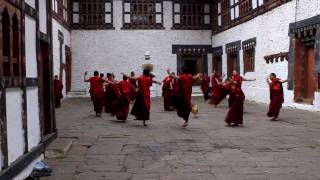 Dancing buddhist monks in Trongsa Dzong Bhutan [upl. by Judah124]