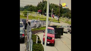 Surveillance video shows people running from shooting at funeral [upl. by Mendelsohn629]