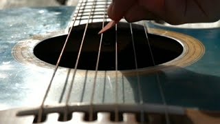 Strumming a Guitar in Slow Motion 1000fps40x [upl. by Attiuqahs848]