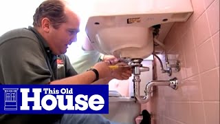 How to Fix a Bathroom Sink Stopper  This Old House [upl. by Yttel]