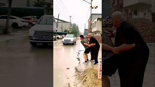 Funny video of standing water on the road funnyshorts trendingshorts entertainment [upl. by Enirehtak]