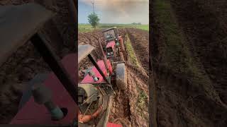 The MTZ tractor is currently immobilized due to being stuck in the mud mtz tractorstuckinmud [upl. by Adlig]