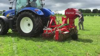 Over sowing grass seed using a Guttler [upl. by Kieger]