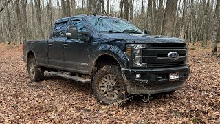 Installing a 2 inch BDS leveling kit on a 1719 superduty [upl. by Orhtej]