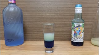 Cocktail Shot Blue Curacao Sour How to make Cocktail Shot Blue Curacao Sour Vodka amp Lemon juice [upl. by Enytsirhc]