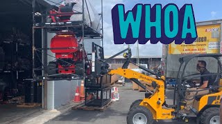 Extremely Strong 25 hp Schaffer Loader Lifting Another Machine  2428 SLT [upl. by Drucie]