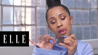 Watch Cardi Bs 90 Second Makeup Routine  ELLE [upl. by Ellenehs406]