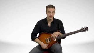 How To Hold An Electric Guitar  Guitar Lessons [upl. by Tlevesor]