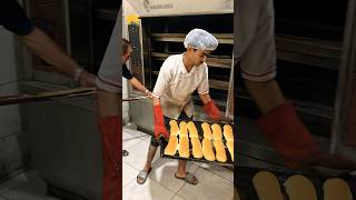 Putting the baguette dough in the oven and taking it out [upl. by Sergio]