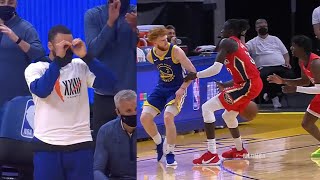 Steph Curry imitating Nico Mannions behindtheback dime from the bench [upl. by Nohsyar]