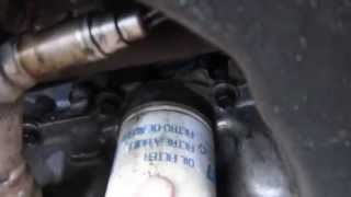 Loose Oil Filter Damages Engine [upl. by Macknair357]