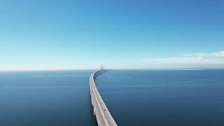 Oresund Bridge Aerialdrone view of Oresund bridge between Malmo Sweden and Copenhagen Denmark [upl. by Artenek]