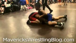 Youth wrestler uses headlock to pin during youth wrestling match [upl. by Nahtanaj]