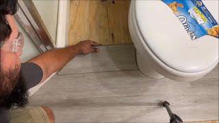 how to cut laminate vinyl FLOORING around toilet doors bath cabinets ANYTHING easy DIY [upl. by Dragelin]