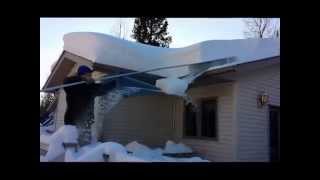 MinnSNOWta Roof Razor in Use  wwwMinnSNOWtaOnlinecom [upl. by Ynaffyt]