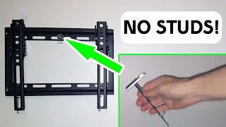 Mounting TV on plaster wall  No studs [upl. by Relyat]