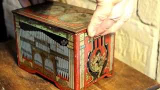 Windup Organ Tin Litho Toy [upl. by Auqenwahs760]