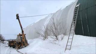 Clearing Snow off the Roof of a Fabric Covered Dome [upl. by Aelgna956]