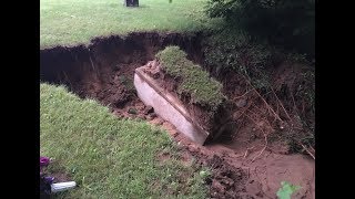 Caskets burial vaults exposed by flooding in Cass County Michigan [upl. by Nerte]