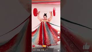 🏋️‍♂️🥇Chinese Olympic weightlifting gold medalist Li Wenwen in Hanfu [upl. by Ahsiaa]