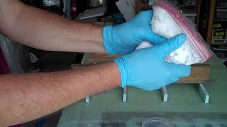 Mixing glass bead microballoon epoxy paste in a bag [upl. by Karon]