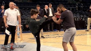 CLASS ACT STPIERRE CHOOSES LUCKY KID TO WORK OUT WHIM AT UFC 217 OPEN WORKOUTS [upl. by Aihseyt]