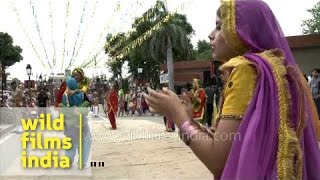 Indian Punjabi girls perform Gidda dance at Wagah border on Independence day [upl. by Aisetra633]