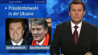 Tagesschau vor 20 Jahren 21112004  Jens Riewa und Reinhold Beckmann [upl. by Hadleigh]