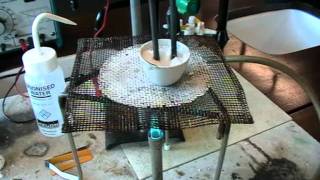 The electrolysis of molten lithium chloride using inert graphite electrodes Demo [upl. by Pelletier]