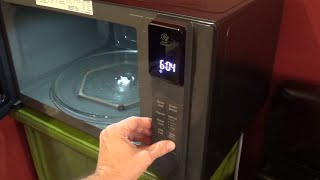 How to Set the Clock on an LG Microwave Oven [upl. by Dadivitan]