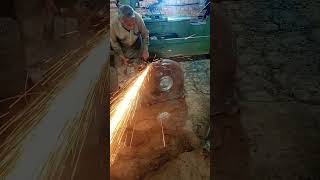 Using grinder making smooth surface of a chakki [upl. by Leind]