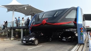 Awesome Chinas futuristic quotstraddling busquot launches 1st road test [upl. by Nuahsyd]